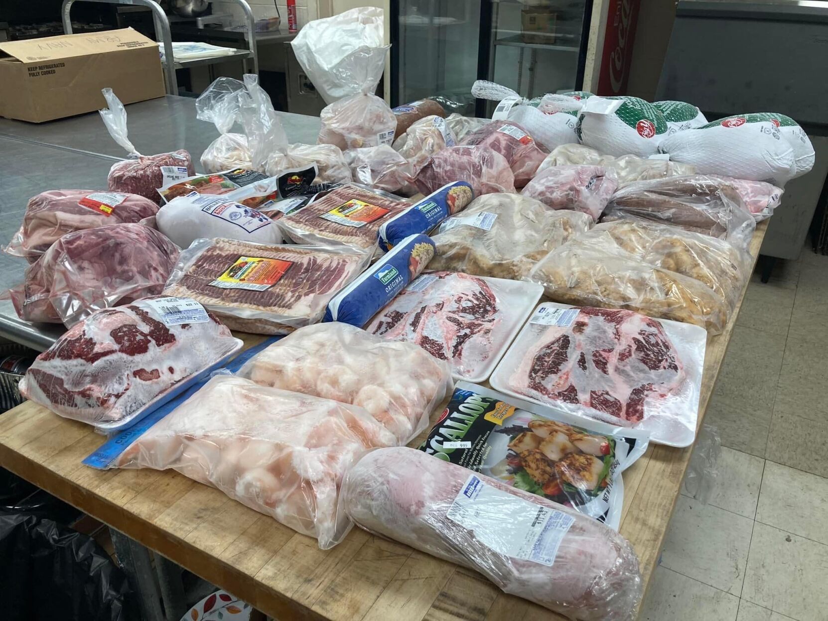 A table with packaged meat on it